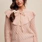 RUFFLED TIE FRONT SWEATER