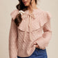 RUFFLED TIE FRONT SWEATER